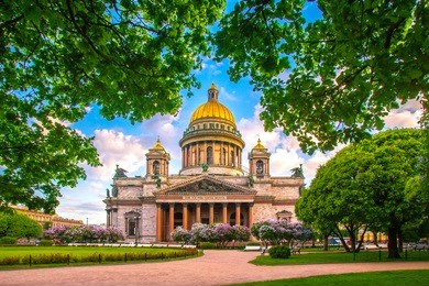 saint petersburg. saint isaac's cathedral. museums of petersburg. st. isaac's square. summer in st. petersburg. st. isaac's cathedral in the crowns of trees. russia.