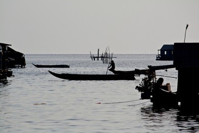 tonle sap floating village, cambodia, an amazing water world on the banks of a river feeding into the tonle sap lake. houses are built on stilts or float to cope with the huge change in water levels.