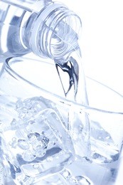 refreshing water in a bottle against a background