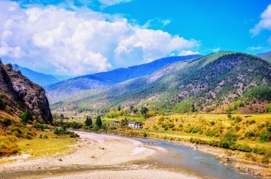 the scenic views of the punakha valley , pho chhu river and surrounding mountains.