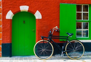 colorful house with a bike near the entrance