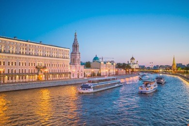 panoramic view of the moscow river and the kremlin palace in russia at sunset