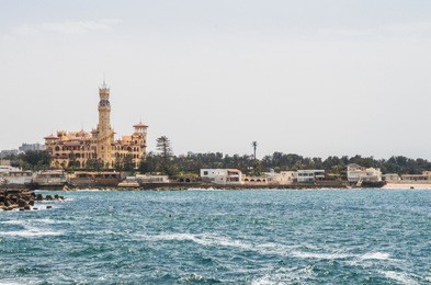 the mediterranean sea in alexandria and the famous montazah palace appears in the horizon 