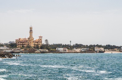 the mediterranean sea in alexandria and the famous montazah palace appears in the horizon 