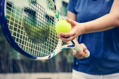 player getting ready for a serve in tennis