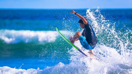 aron alvarez, a young promise of costa rican surfing. riding the waves. costa rica, surfing paradise.