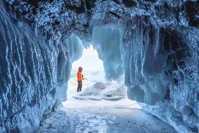 frozen ice cave at frozen lake baikal in siberia, russia