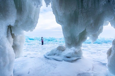 frozen ice cave at frozen lake baikal in siberia, russia