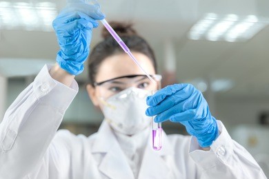 young female scientist working in laboratory