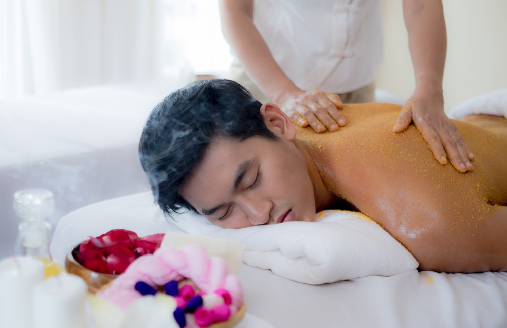 a handsome man relaxing at the spa, beauty treatment concept