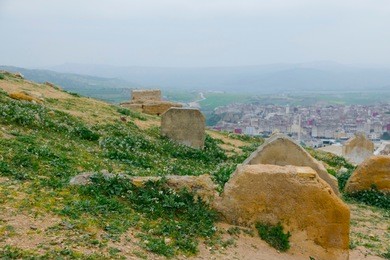 the marinid tombs or merenid tombs refer the ruins of monumental tombs on a hill above and north of fes al-bali, the old city of fez, morocco. 