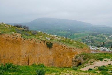 the marinid tombs or merenid tombs refer the ruins of monumental tombs on a hill above and north of fes al-bali, the old city of fez, morocco. 