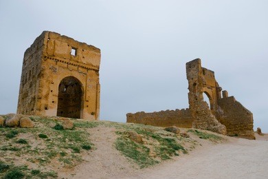 the marinid tombs or merenid tombs refer the ruins of monumental tombs on a hill above and north of fes al-bali, the old city of fez, morocco. 
