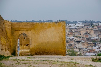 the marinid tombs or merenid tombs refer the ruins of monumental tombs on a hill above and north of fes al-bali, the old city of fez, morocco. 