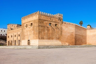 the kasbah of the udayas fortress in rabat in morocco. the kasbah of the udayas is located at the mouth of the bou regreg river in rabat, morocco. rabat is the capital of morocco.