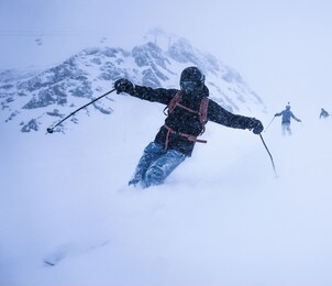 skiing down a cold mountain