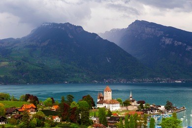 spiez old castle in bern switzerland near lake thun and mountain