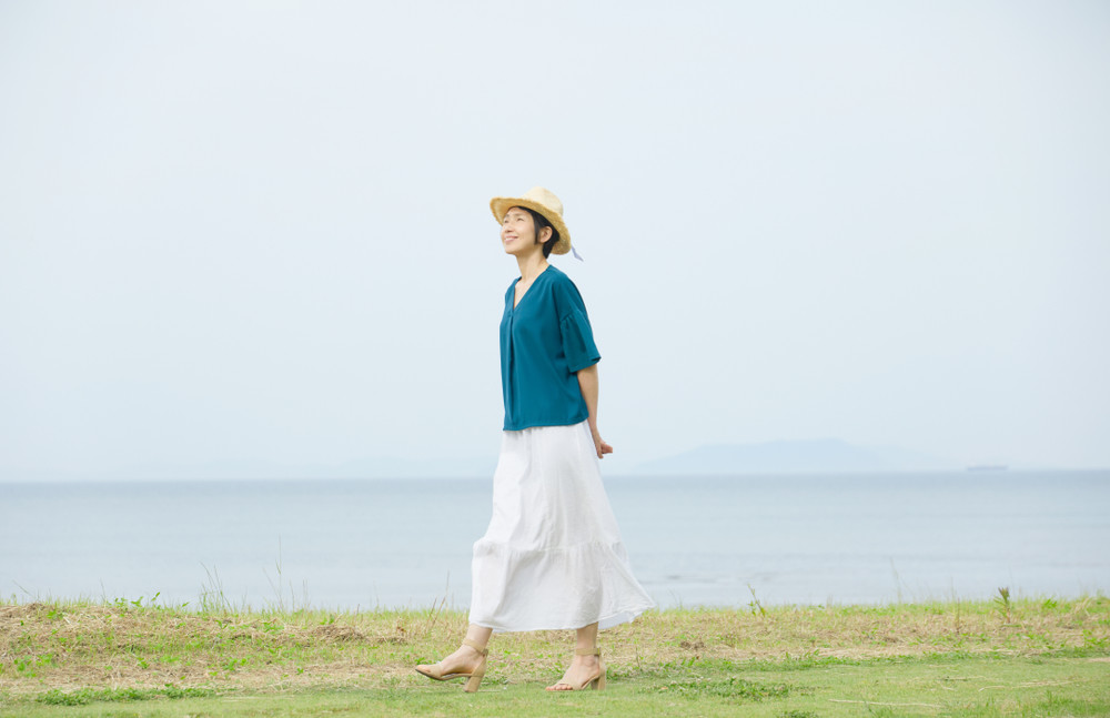 asian woman walking outdoor