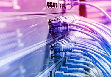 network cables in switch and firewall in cloud computing data center server rack