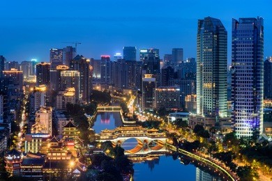 the night view of chengdu jiuyanqiao cbd with the traditional anshun bridge and the modern skyscrapers.