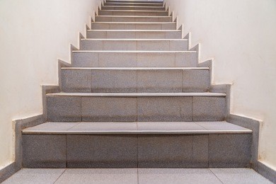 stairs. abstract steps. stairs in the city. granite stairs. stone stairway often seen on monuments and landmarks, wide stone stairs.