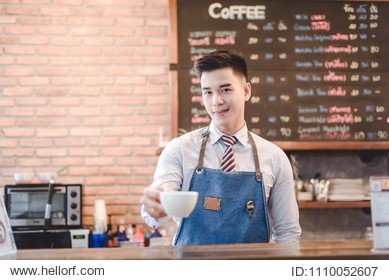 asian man barista smiling and using coffee machine in coffee shop counter - working man small business owner food and drink cafe concept
