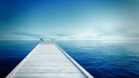 white lounger & wooden pier on the tropical beach with blue sea and sky / 3d render perspective