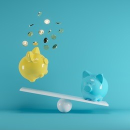 blue and yellow piggys bank playing with gold coin on seesaw on blue background. minimal idea funny concept.