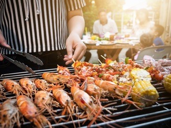 bbq party happy summer family dinner at home outdoor vintage style parent and child charcoal stove.