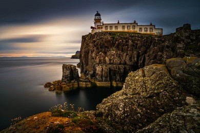 lighthouse on neist point cliffs, isle of skye, scotland