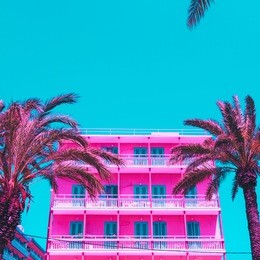 pink palm trees and a hotel against the turquoise sky. bright neon colors. minimal and surreal. summer vacation. urban style
