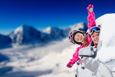winter holiday, ski, travel - happy family on the road for winter holidays