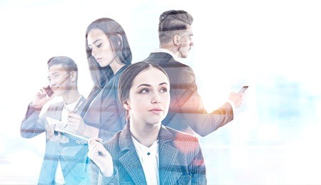 business people standing together. a foggy city background. concept of a teamwork in international law company. toned image double exposure mock up.