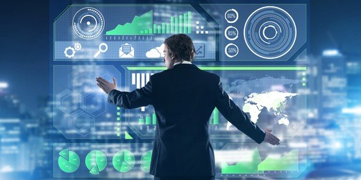 back view of businessman working with virtual panel and night city at background