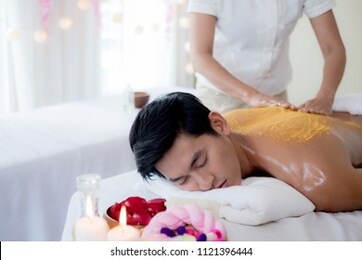 a handsome man relaxing at the spa, beauty treatment concept