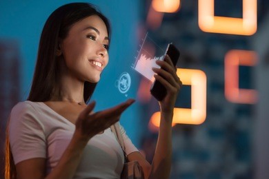 a young beautiful asian woman using innovative technologies as an application in her smart phone to monitor sales analytics. communicate about business, future, technology, statistics, data, people