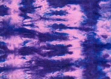 texture of natural linen fabric. batik.textile shibori print. indigo blue tie-dye textile. watercolor effect.