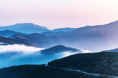 mountain peaks in morning fog - foggy morning over wutai mountains in shanxi, china