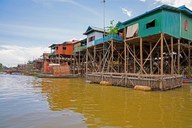 homes on stilts on the floating village of kampong phluk, tonle sap lake,siem reap province, cambodia