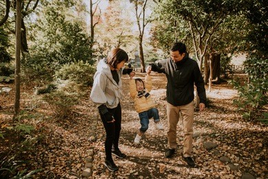 happy japanese family spending time outdoor