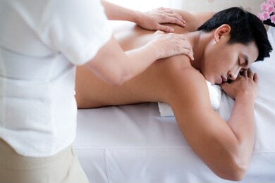 a handsome man relaxing at the spa, beauty treatment concept