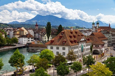 skyline of luzern looking over the river towards the old city with the footbridges