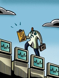 doctor walking over a row of monitors while holding a clipboard