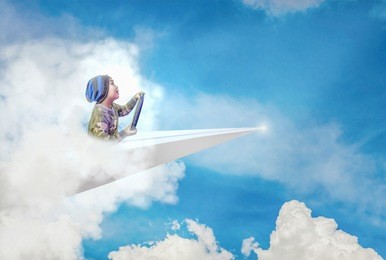 cute little boy enjoy driving paper planes, concepts, learning and imagination.
