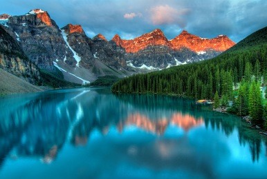 taken at the peak of color during the morning sunrise at moraine lake in banff national park.
