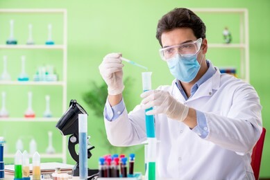 man chemist working in the lab