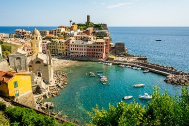 horizontal view of the coloured town of vernazza and its ittle bay. italy, national park of the cinque terre