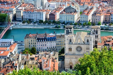 view of vieux lyon with the saint jean cathedral and the banks of the saone river from the fourviere hill. the old town of lyon, france, is a popular tourist attraction