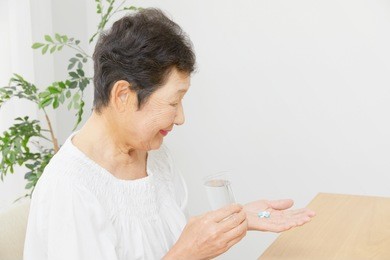 asian woman having the medicine