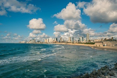 view of the modern district of tel aviv, israel, and the sea shore from the historic part of the city
